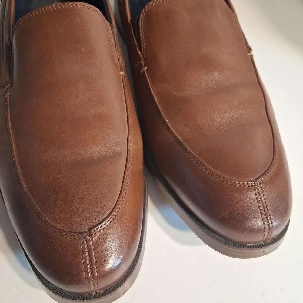 Mens brown leather loafers slip onCole Haan new condition no flaws